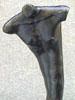 Male, black, kneeling, piece no. 2. Partial.